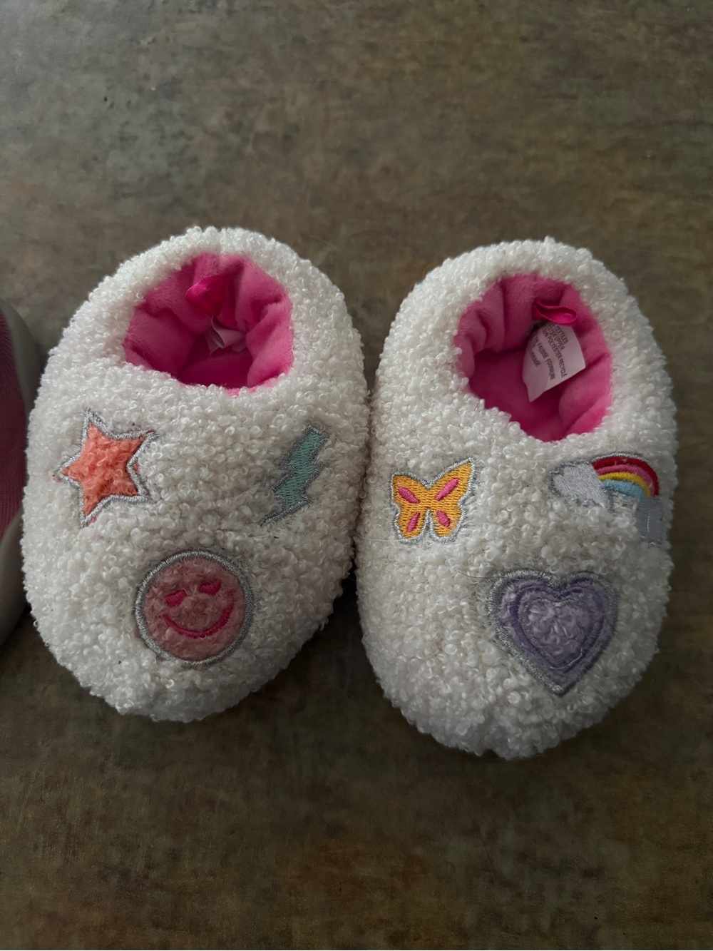 Cozy White Fuzzy Kids Slippers with Pink Lining and Fun Patches